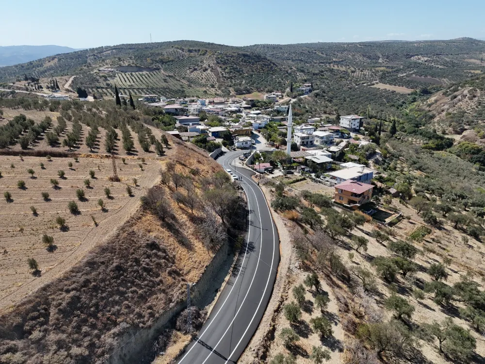 İKİ İLÇEYİ BAĞLAYAN YOL ASFALTLANDI